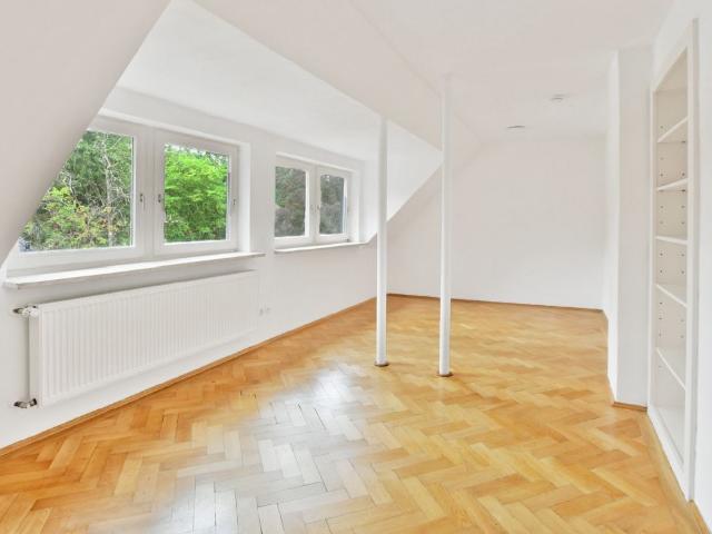 AIGNER Stilvolle 2 Zimmer Dachgeschosswohnung in Pullach!