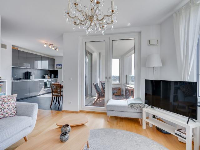 AIGNER Wohnen über den Dächern: 3 Zimmer Wohnung mit Süd Loggia und traumhaftem Alpenblick