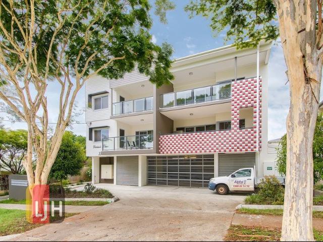 AIR CONDITIONED 2 BEDROOM UNIT WITH SPACIOUS BALCONY !