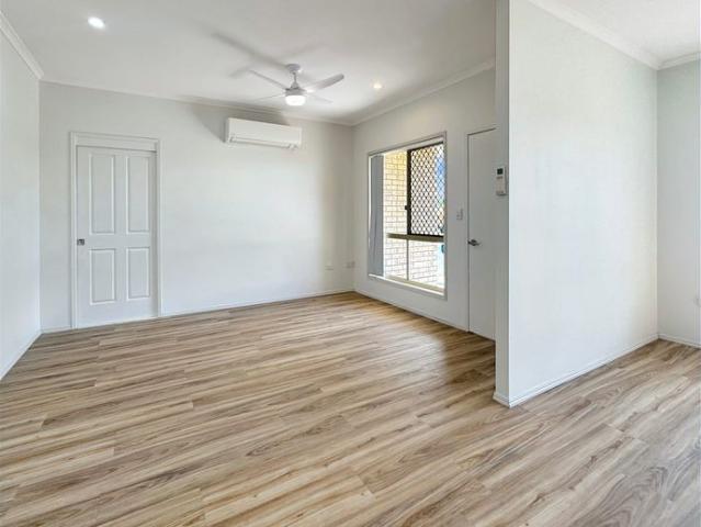 AIR CONDITIONED LOW SET BRICK HOME