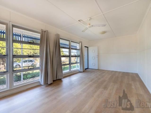 Air conditioned Living Room to Renovated Home in Sought After Svensson Heights