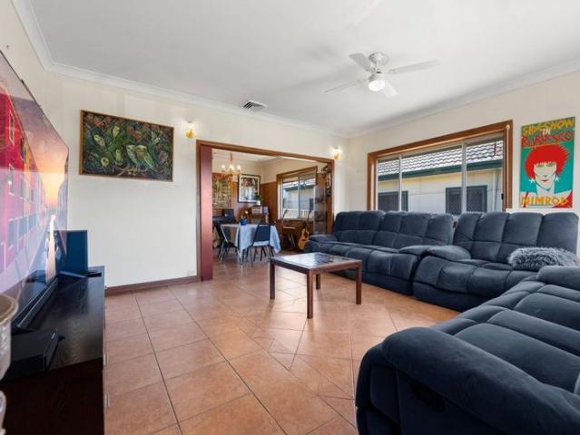 Air Conditioned Three Bedroom Home with Updated Kitchen and Tiled Living Areas!
