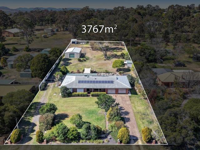 ALMOST AN ACRE, GREAT SHED CAPACITY, EASY ACCESS, ELEVATED COMFORT