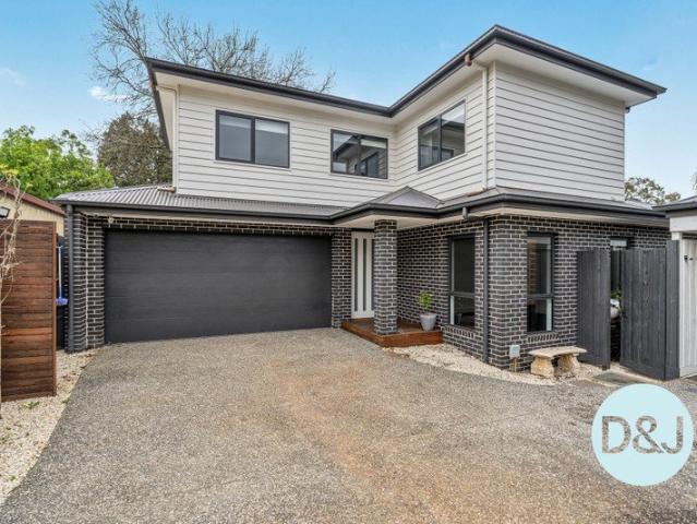 Almost New Luxury Townhome with Space, Style & Quality Finishes