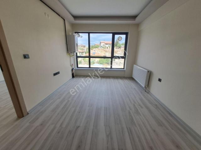 Alaçatı Gayrimenkulden İncek'te Kiralık 1+1 Daire