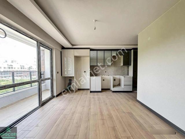 Alaçatı'dan İncek Taşpınar'da Ara Kat Düz 2+1 Satılık Daire