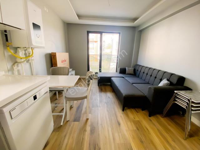 Alaçatı'dan İncek'te Bulvara 50 M Sıfır Eşyalı 1+1 Kiralık
