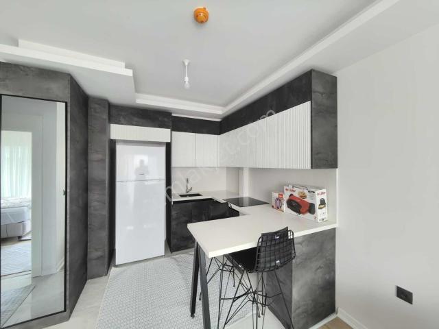 Alaçatı'dan Site İçi Arakat Güney Cephe Cambalkon Full Esyalı1+1