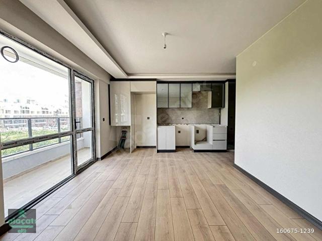 ALAÇATI'DAN İNCEK TAŞPINAR'DA ARA KAT DÜZ 2+1 SATILIK DAİRE