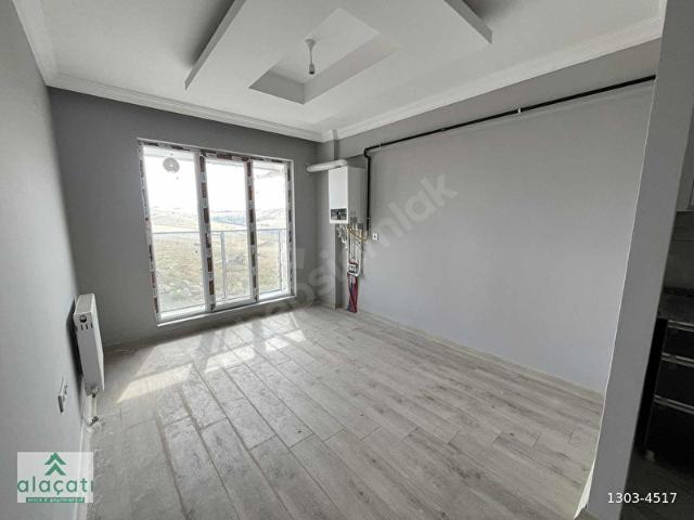 ALAÇATI'DAN VADİ MANZARALI KREDİYE UYGUN SATILIK 1+1 DAİRE
