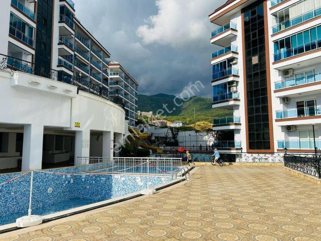 Alanya Cikcilli’de Deniz Ve Dağ Manzaralı Prestijli Sitede 1+1 Satılık Daire