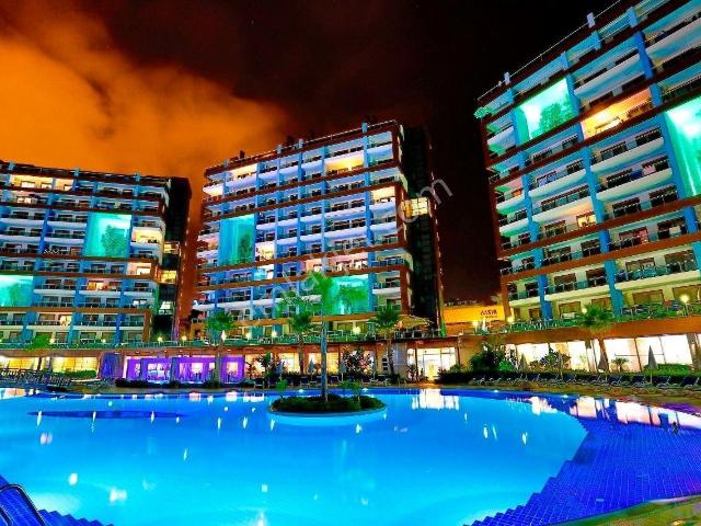 Alanya Cikcilli'de Havuz Ve Bahçe Manzaralı Merkezi Konumda 2+1 Satılık Daire
