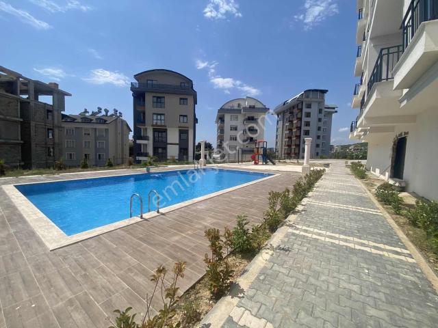 Alanya Avsallar'da Deniz Manzaralı Havuzlu Satılık 1+1 Daire