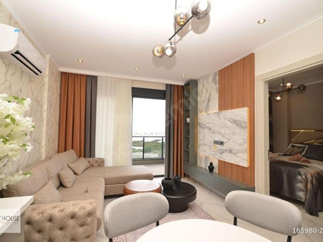 ALANYA DEMİRTAŞ'TA DENİZ VE HAVUZ MANZARALI 1+1 SATILIK DAİRE