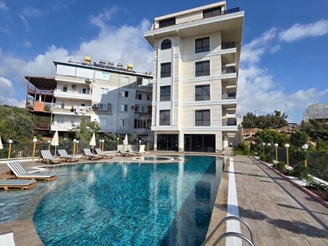 ALANYA KESTEL LÜKS SİTE İÇİ SATILIK DENİZ MANZARALI 1+1