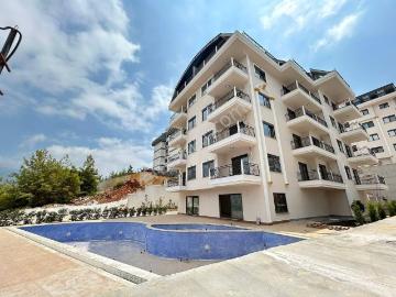 Alanya Oba’da Sıfır Binada Manzaralı Fırsat 1+1 Satılık Daire