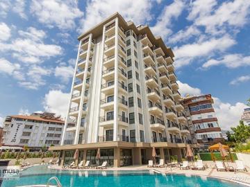 ALANYA OBA'DA 1+1 DENİZE YÜRÜME MESAFESİNDE DENİZ MANZARALI EŞYALI DAİREMİZ