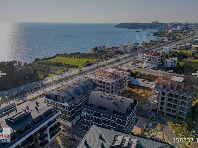 ALANYA OKURCALAR MEVKI DE DENIZE SIFIR SATILIK LÜKS 2+1 DAIRE