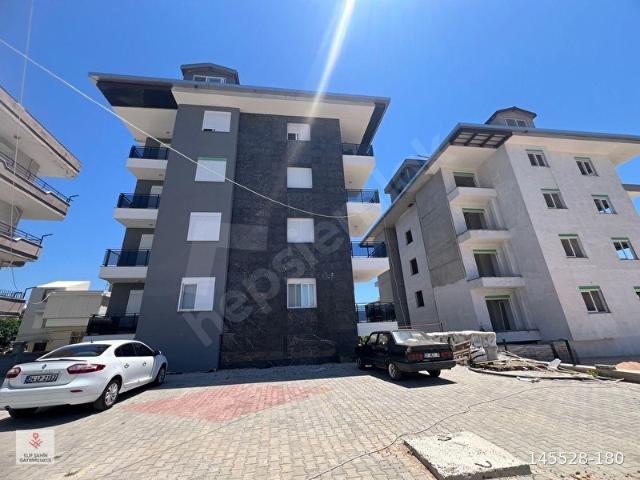 ALANYA OKURCALAR SİTE İÇİ SATILIK 1+1 DAİRE DENİZE 200 METRE