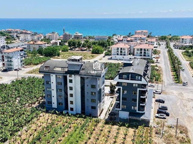 ALANYA OKURCALAR'DA KİRALIK KISMİ EŞYALI 1+1 GENİŞ DAİRE