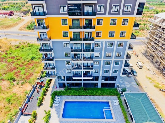 Alanya Mahmutlar'da Satılık 1+1 Deniz Ve Kale Manzaralı Daire