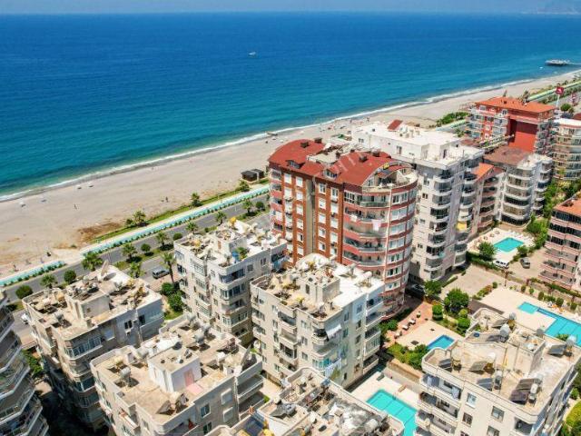 Alanya Mahmutlarda Satılık Denize Sıfır Sitede 3+1 Yazlık Kendi Plaj Yolu Geniş Havuzlu