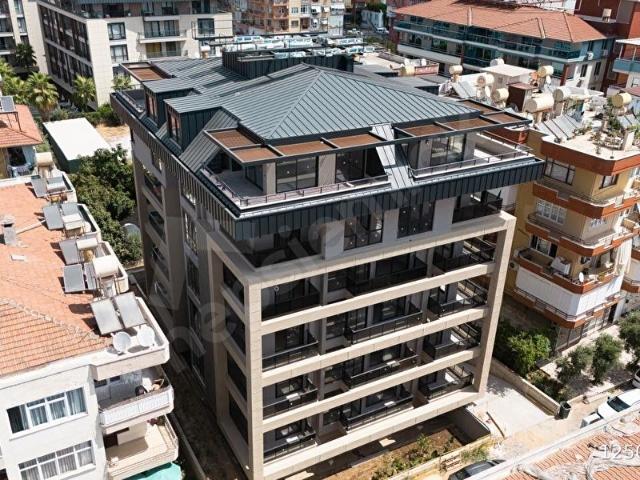 ALANYA MERKEZ'DE SIFIR BİNADA DENİZE 100 METRE 2+1 SATILIK DAİRE