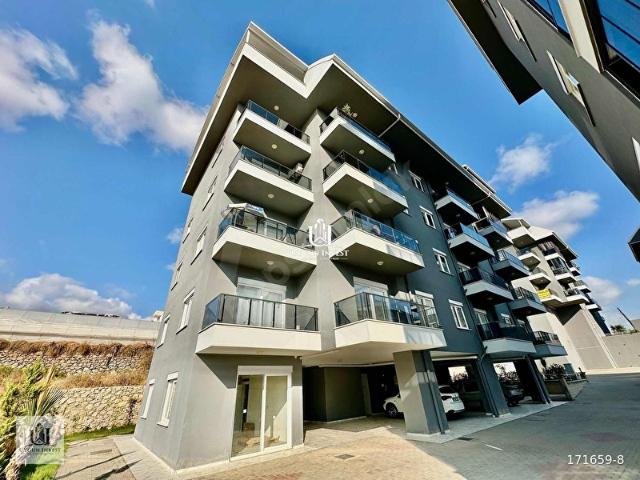 ALANYA PAYALLAR'DA SATILIK 1+1 SİTE İÇERİSİNDE GENİŞ YENİ DAİRE