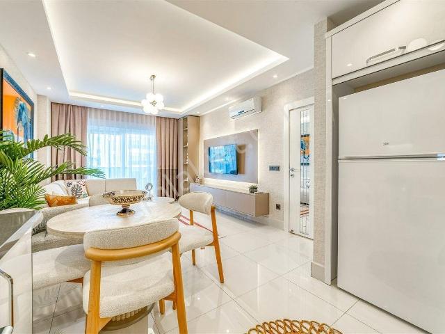 Alanya Tosmur’da Deniz Manzaralı Ultra Lüks Eşyalı 1+1 Satılık Daire