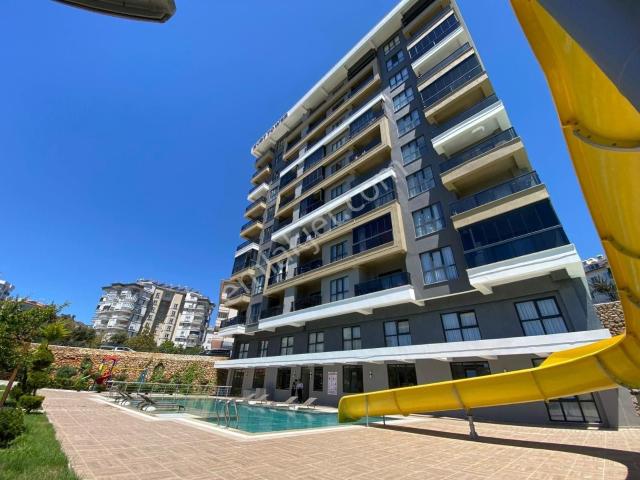 Alanya Tosmur’da Deniz Manzaralı Ve Vatandaşlığa Uygun 2+1 Satılık Daire