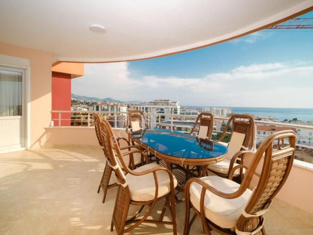Alanya Tosmur’da Kale & Deniz Manzaralı Eşyalı 2+1 Satılık Daire
