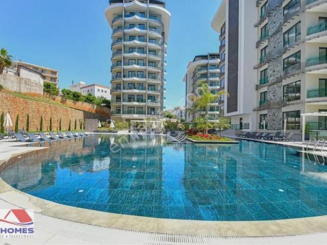 Alanya Tosmur'da Deniz Sıfır, Eşyalı 1+1 Kiralık Daire