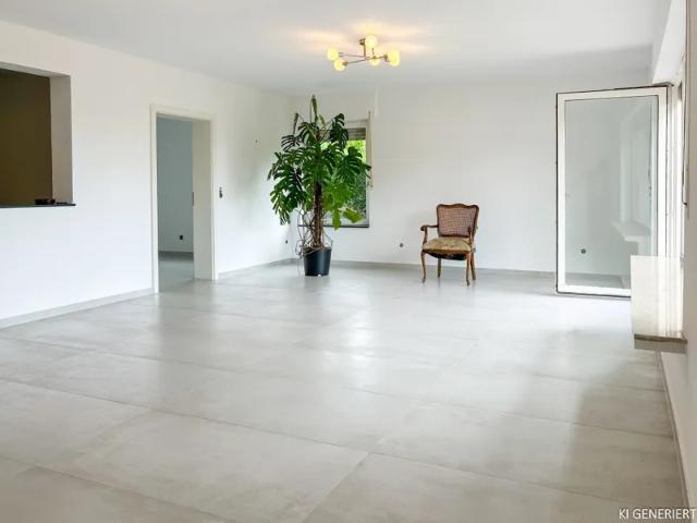 Alles auf Anfang: Frisch renovierte 1,5 Zimmer Souterrainwohnung mit Terrasse und Grünblick