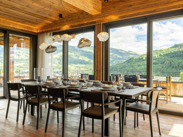 Alpiner Luxus auf höchstem Niveau – Exklusive Designer Villa mit unverbaubarem Hahnenkamm Panorama