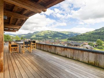 Alpiner Luxus auf höchstem Niveau – Exklusive Designer Villa mit unverbaubarem Hahnenkamm Panorama