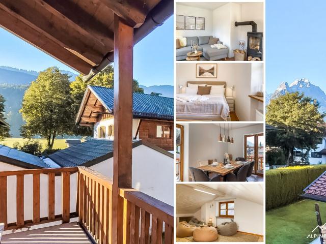 ALPINESTAY #1 Stylish and quiet flat for 6 in Garmisch Partenkirchen: Balcony with mountain views | fireplace | home theater | car park