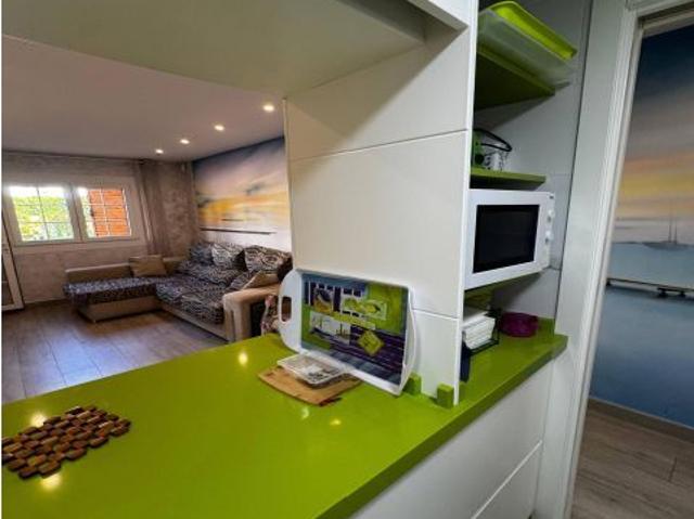 Alquiler de Piso bajo en urbanización privada con Piscina y zonas verdes en Santiago de la Ribera
