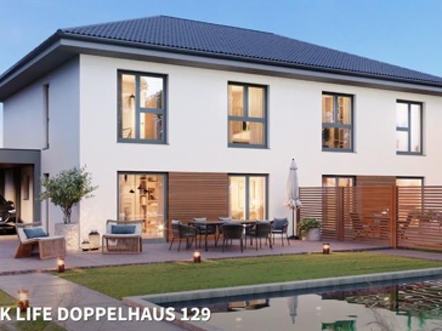Als Zweifamilienhaus oder auch zwei Doppelhaushälften möglich. Mit Keller, Süd West Garten