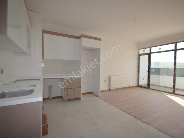 Altınşah Emlak'tan Site İçerisinde E.banyolu 2+1