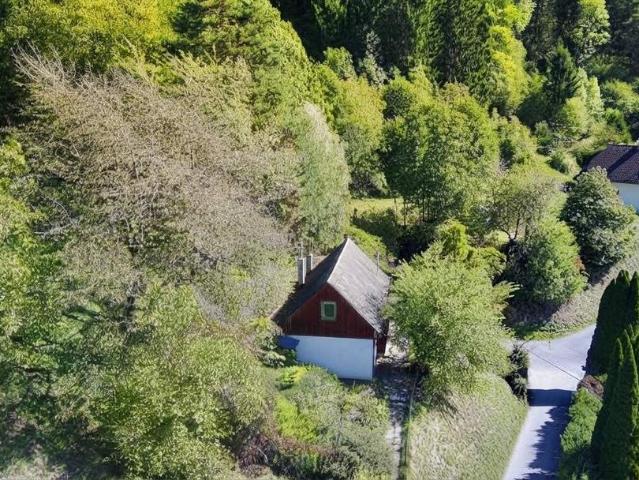 Altbau mit Potenzial in Hanglage für Visionäre mit traumhaftem Blick nach Süden