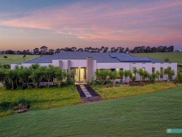 Amazing modern family home on 10 acres presents like a display home