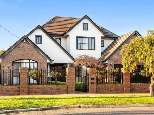 AMERICAN TUDOR | A Family Home of Enduring Beauty, Rare Craftsmanship and Unmistakable Presence