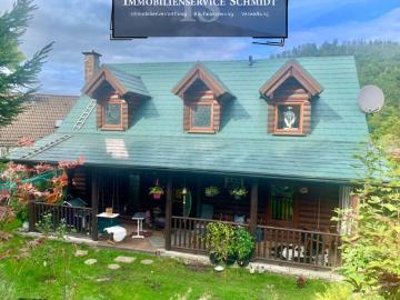 Amerikanisches Blockbohlenhaus Holzhaus Freistehendes Einfamilienhaus auf einem schön angelegten Grundstück in Schalksmühle Strücken