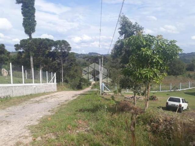 Ampla área em condomínio particular