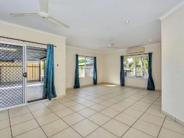 AMPLE OPEN PLAN LIVING WITH INGROUND SWIMMING POOL