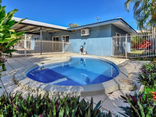 AMPLE OPEN PLAN LIVING WITH INGROUND SWIMMING POOL