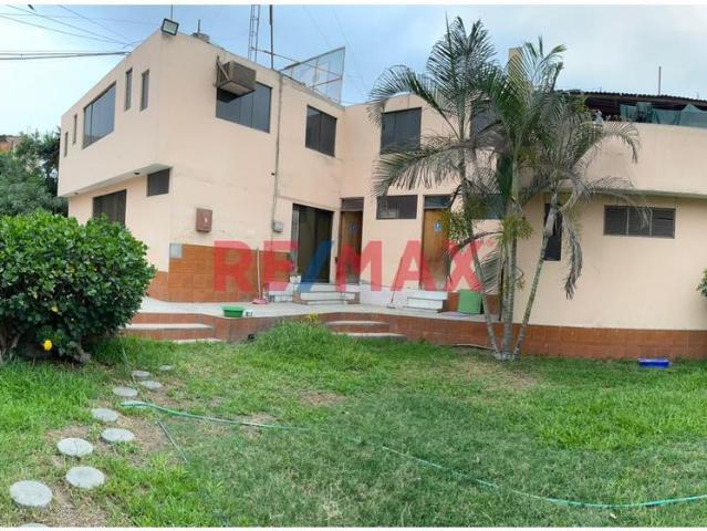 Amplio Terreno De 1,005 M² Con 2 Casas – Gran Potencial De Inversión En Comas