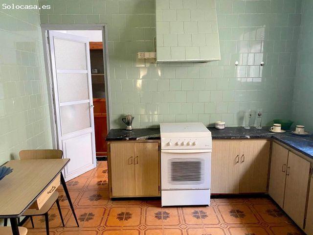 AMPLIA VIVIENDA CON PATIO Y GARAJE