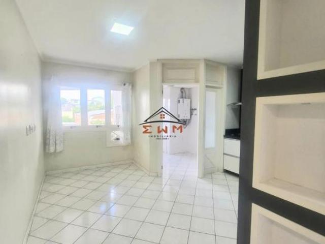 Amplo apartamento de 3 dormitórios com suíte e sacada
