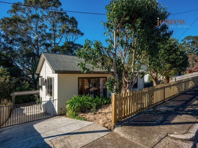 An unexpected 2 bedroom with a great rumpus room!